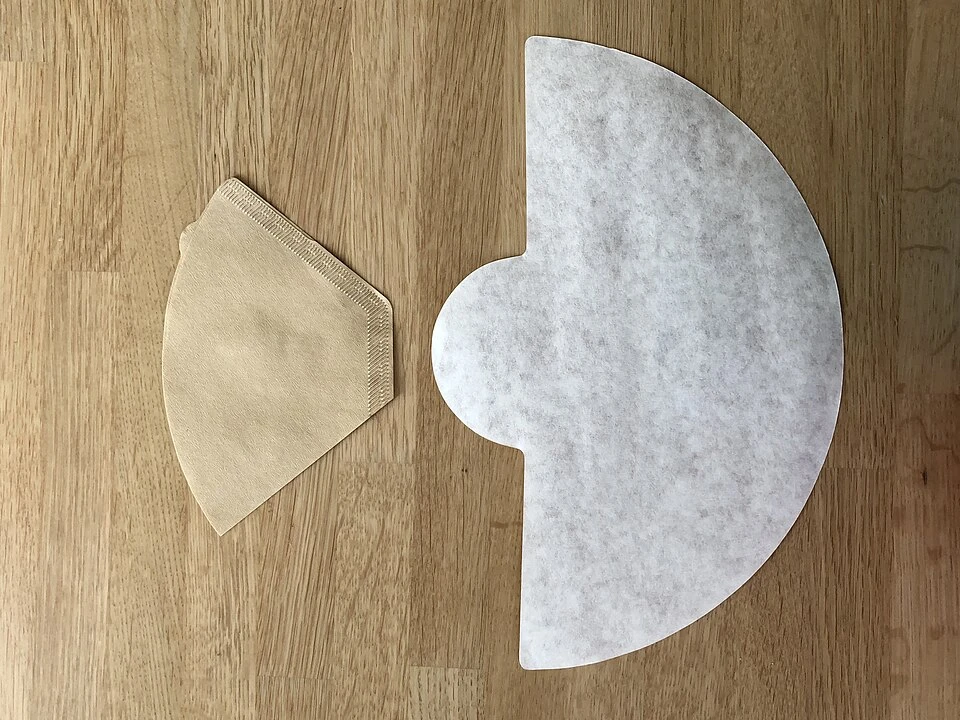 Chemex coffeemaker half moon unfolded filter with regular filter.jpg